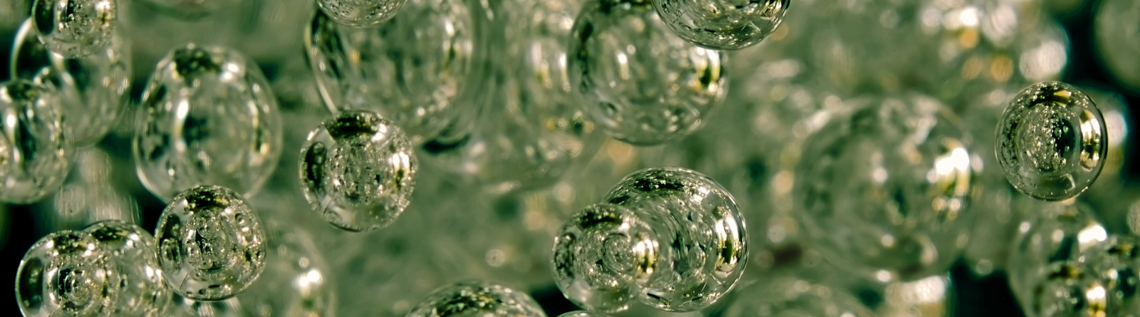 Header Image_Green Glass Orbs